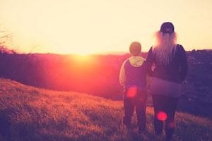 Family looking at a sunset dreaming for Permanent Residence